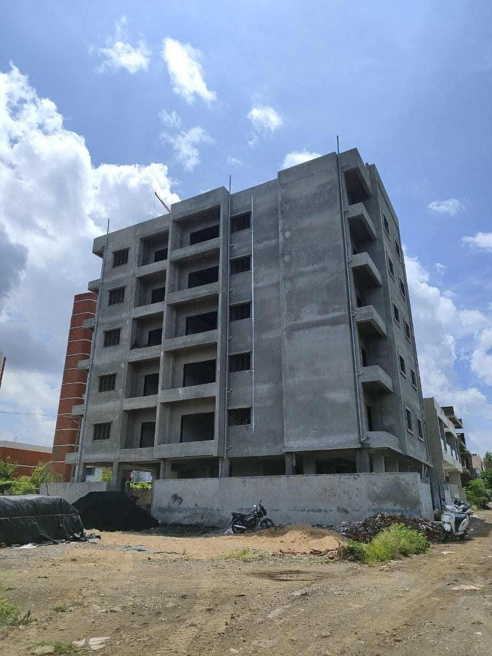 Genesis Lofts building on site with structure and plaster complete